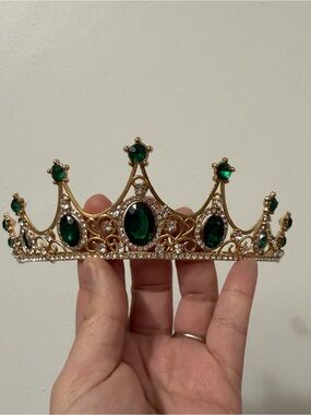 Two Gold Tiara’s with Emerald Green Gems and one with black gems